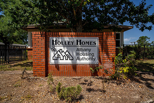 Brick sign stating Holley Homes Housing Authority