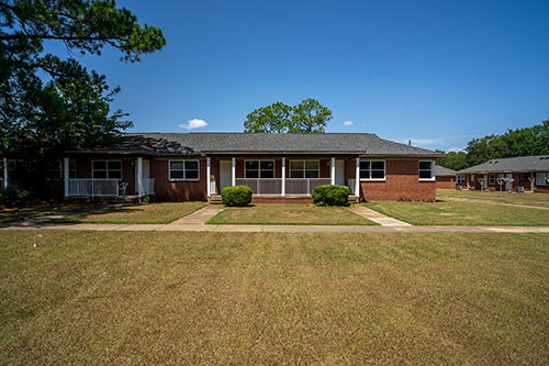 Front view of brick Holley Homes Apartments