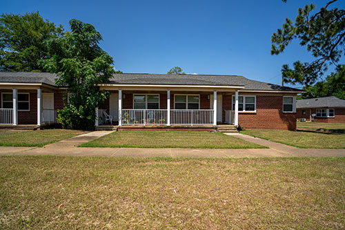 Front view of brick Holley Homes Apartments